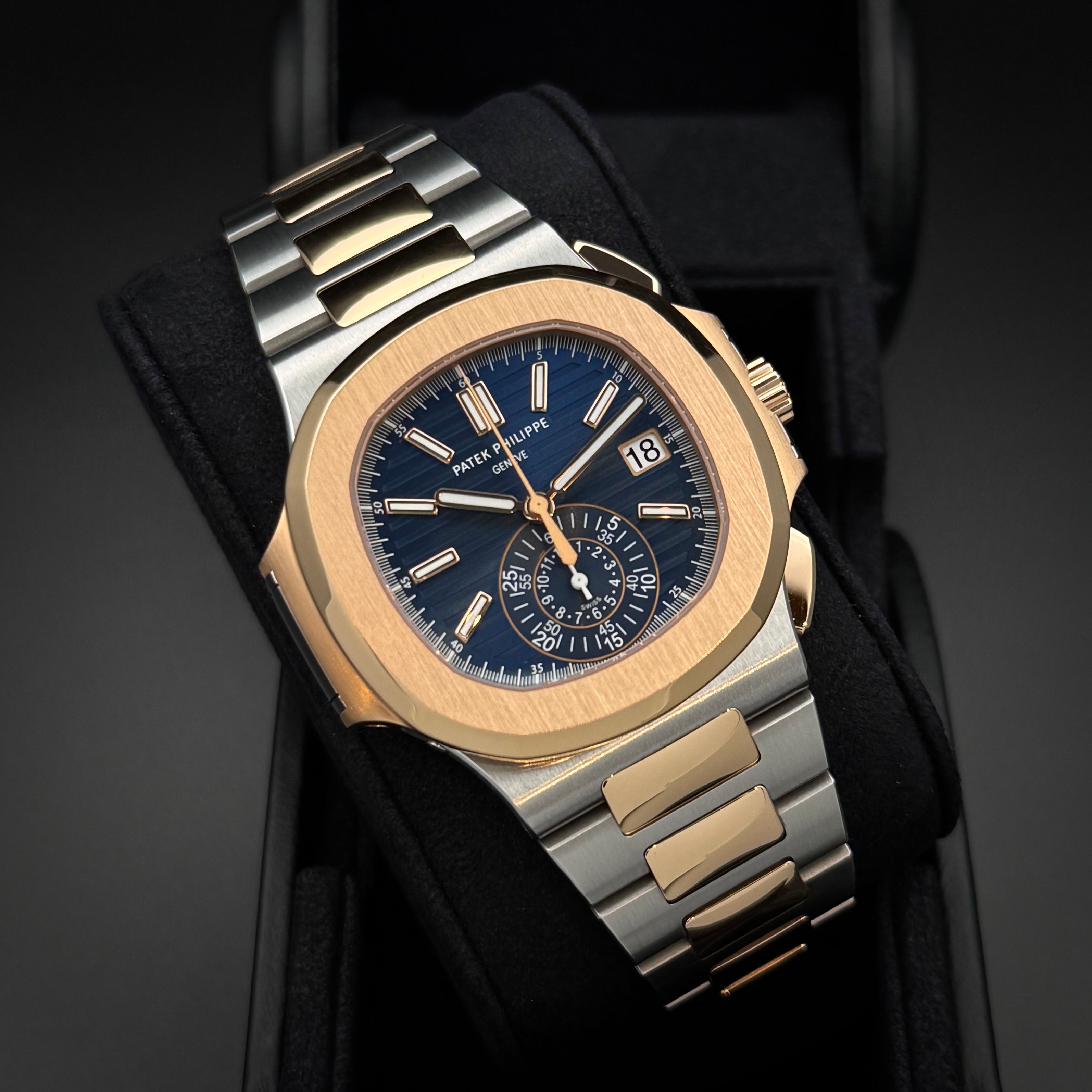 Patek Philippe Nautilus Chronograph Gold/Stahl Blaues Zifferblatt